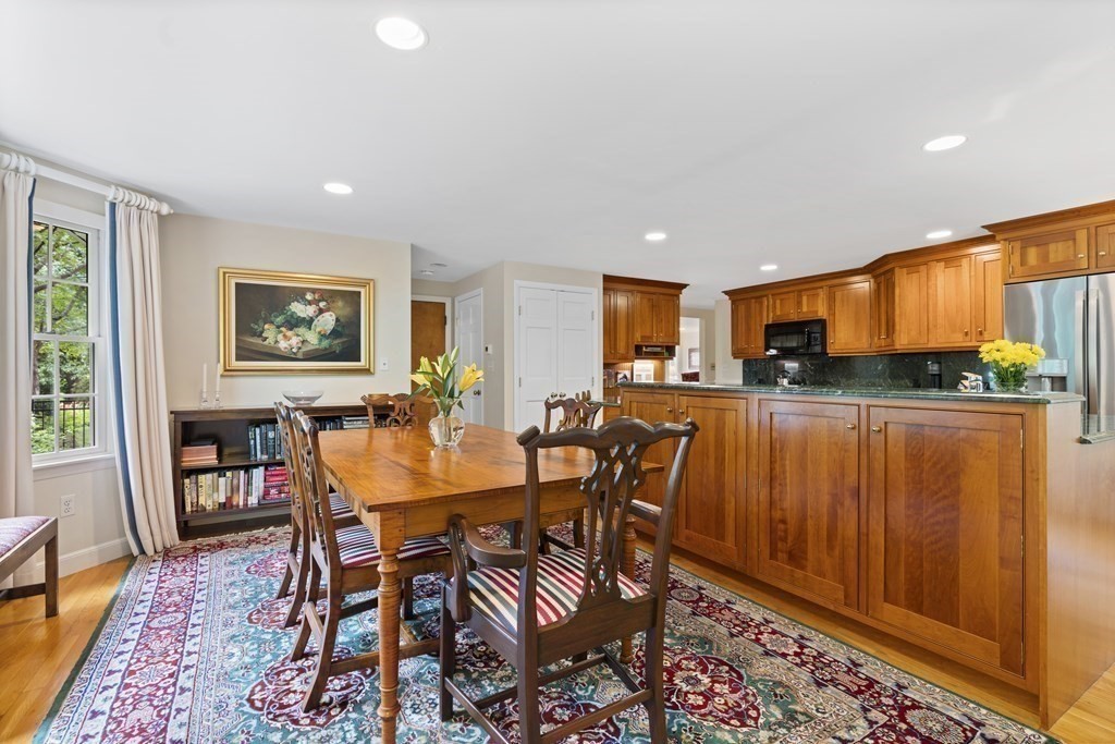118 Parker Road Wellesley, MA 02482 - Photo 8 of 33 a view of a dining room with furniture window and wooden floor