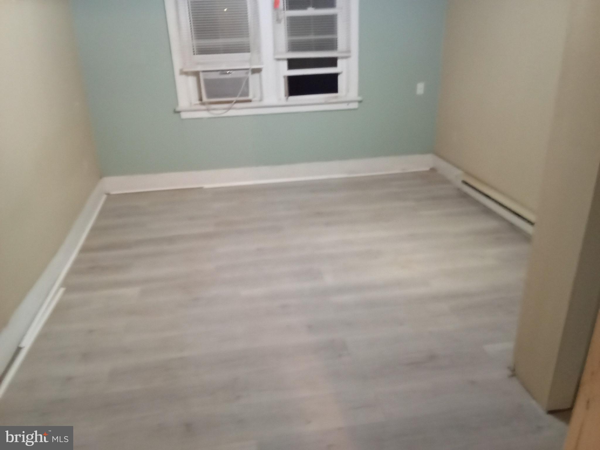 37 Asbury Avenue Dover, DE 19901 - Photo 13 of 16 a view of an empty room with a window