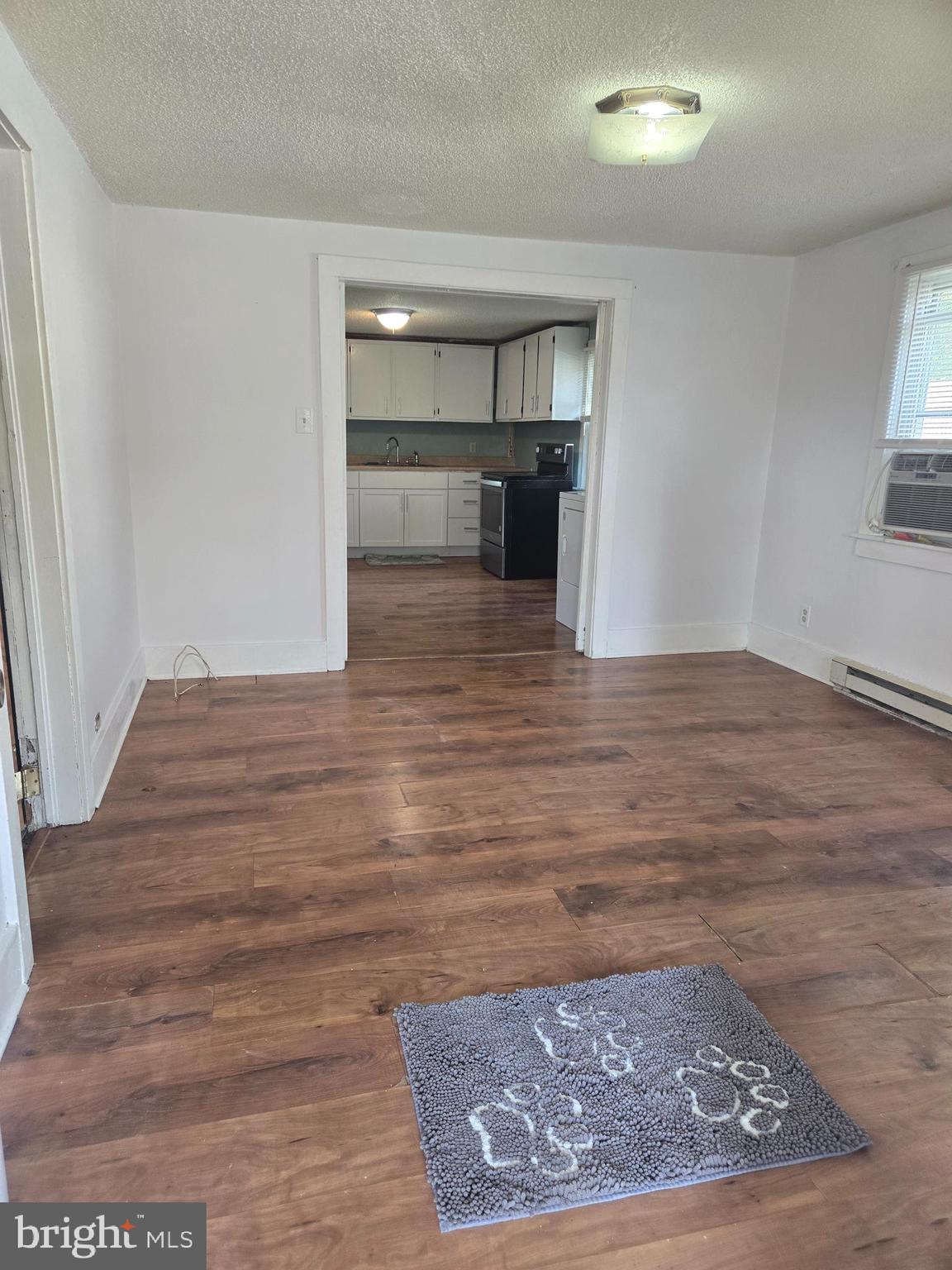 37 Asbury Avenue Dover, DE 19901 - Photo 6 of 16 a view of empty room with wooden floor