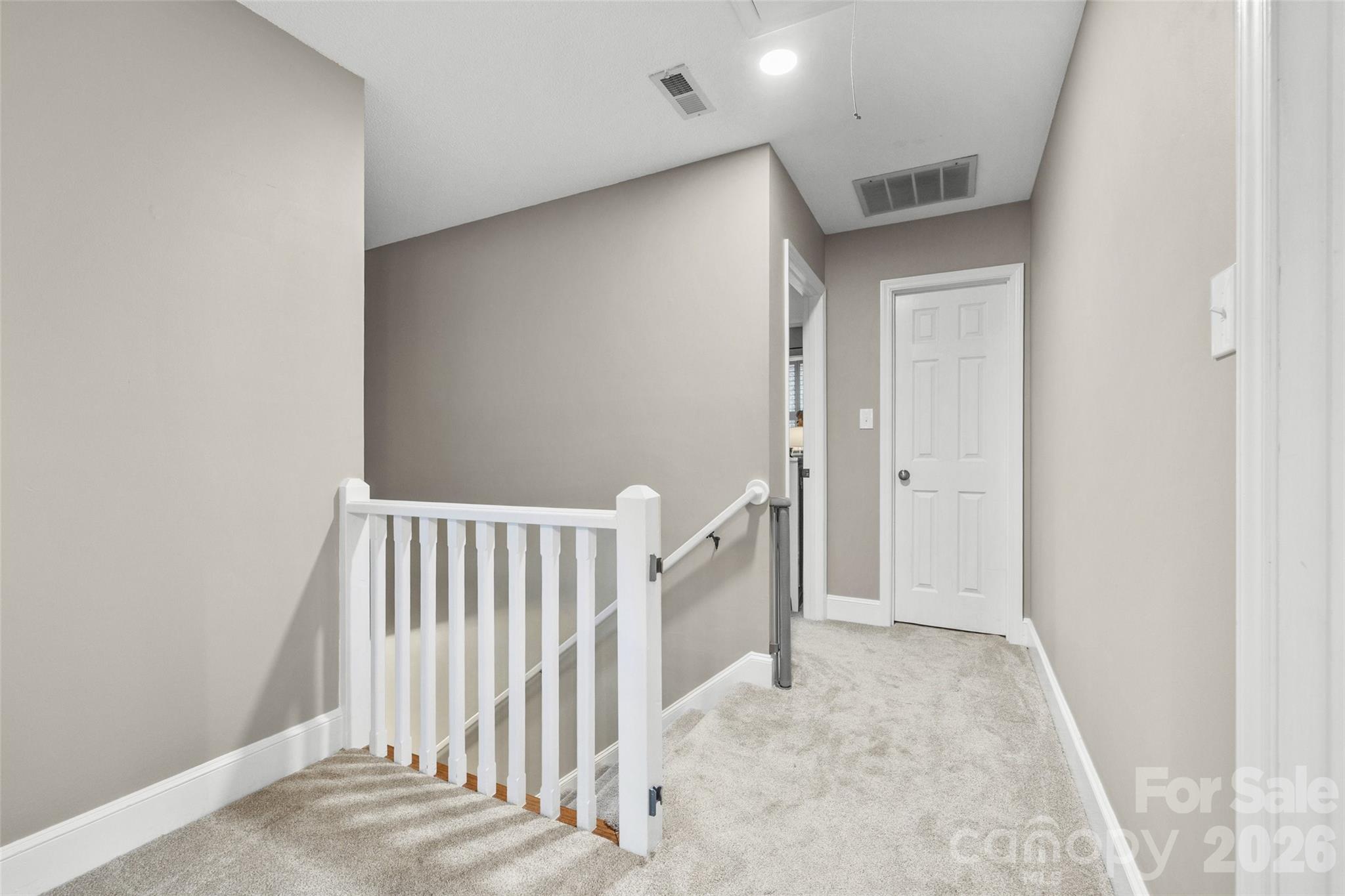 10500 Doylestown Road Matthews, NC 28105 - Photo 23 of 46 a view of a hallway with white walls
