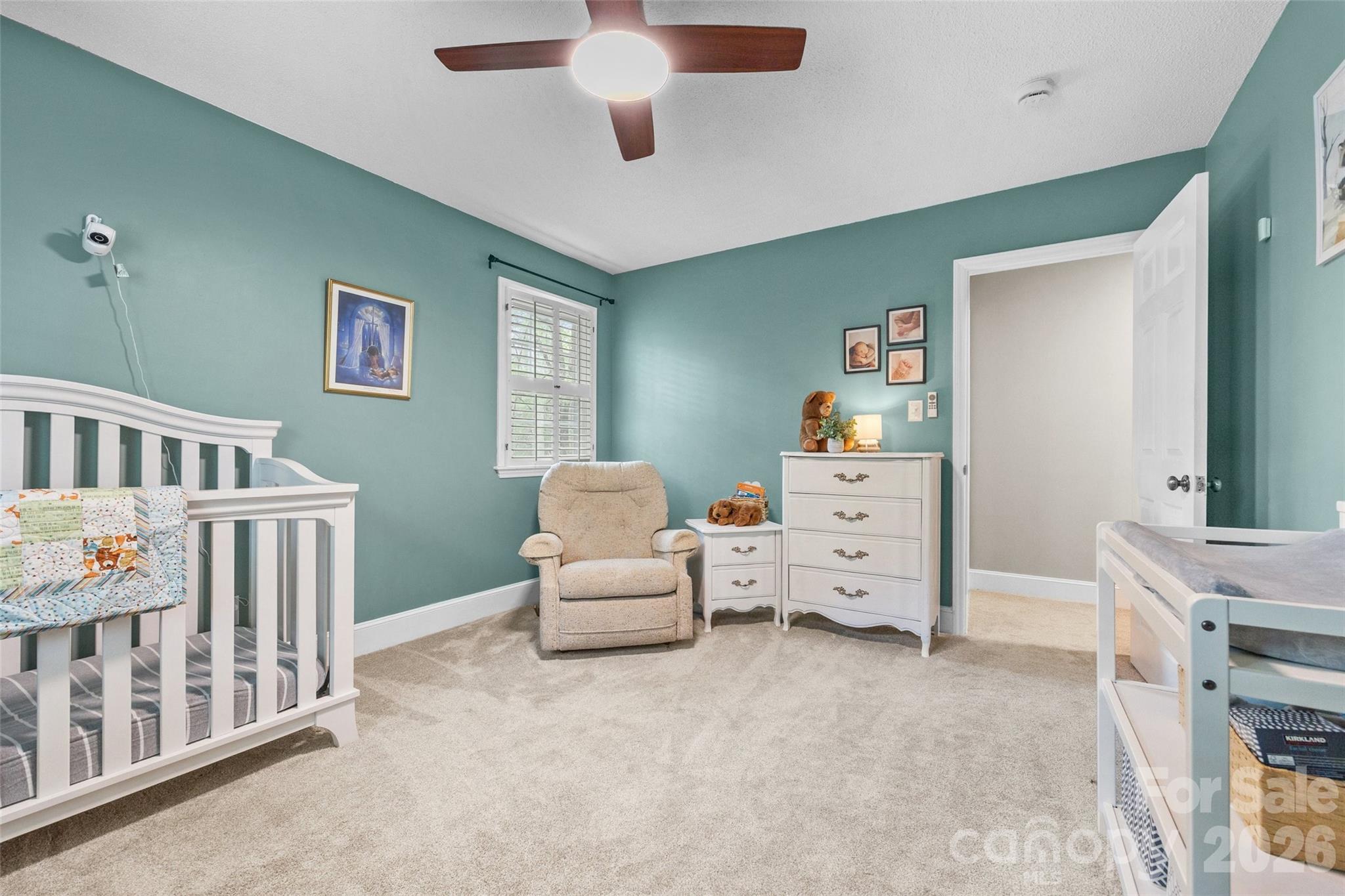 10500 Doylestown Road Matthews, NC 28105 - Photo 27 of 46 a bedroom with furniture and a window