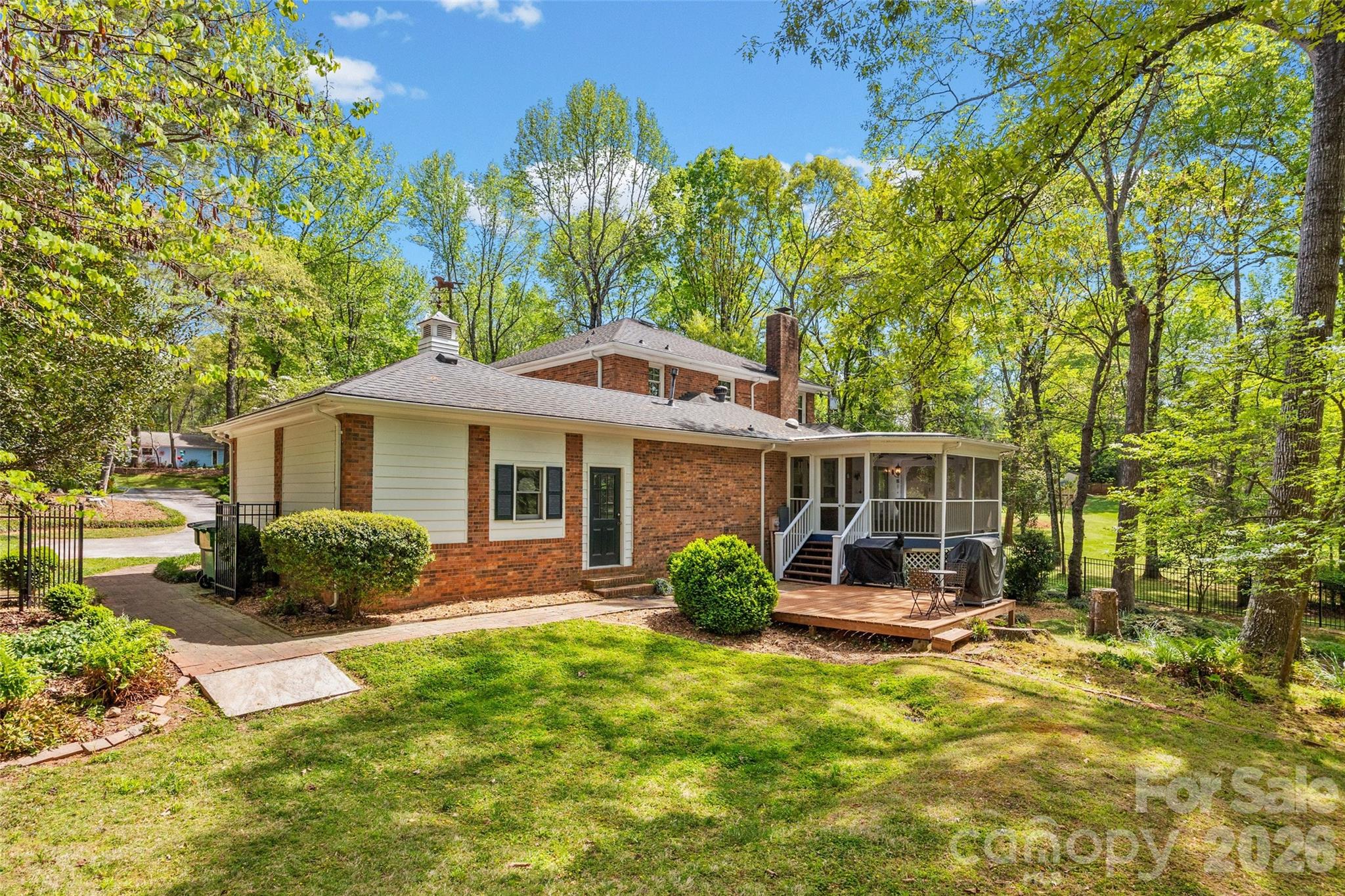 10500 Doylestown Road Matthews, NC 28105 - Photo 37 of 46 a front view of a house with garden