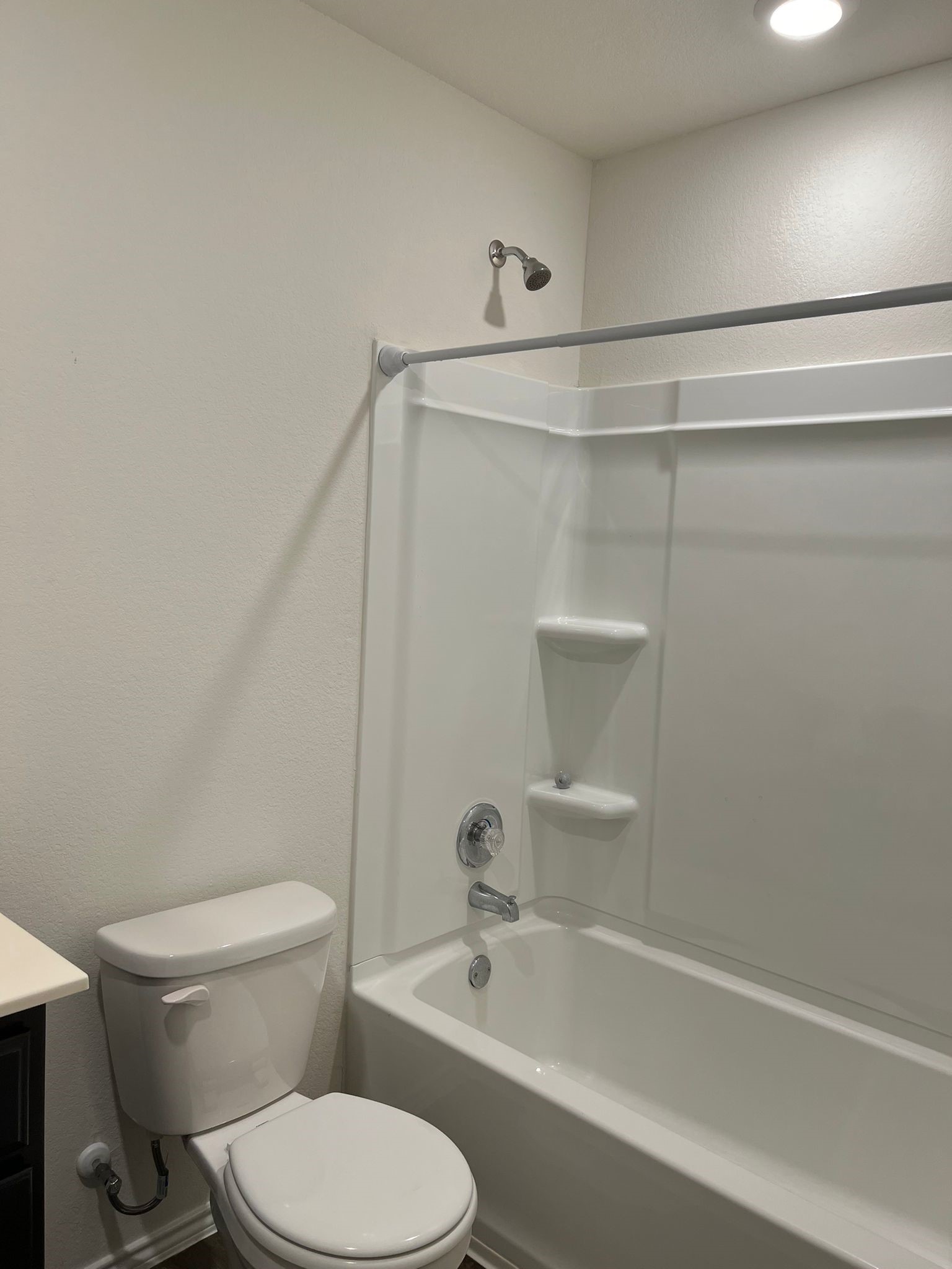 14901 Bajada Rd Manor Manor, TX 78653 - Photo 5 of 14 a bathroom with a toilet and a bathtub