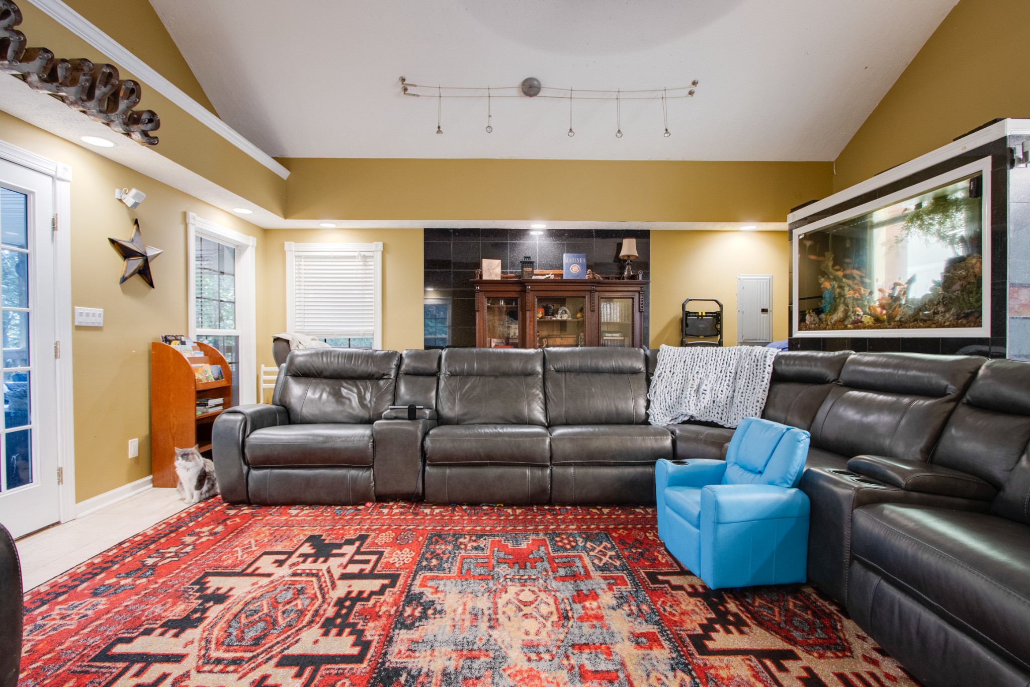 2832 Rader Ridge Court Antioch, TN 37013 - Photo 12 of 26 a living room with furniture and a flat screen tv