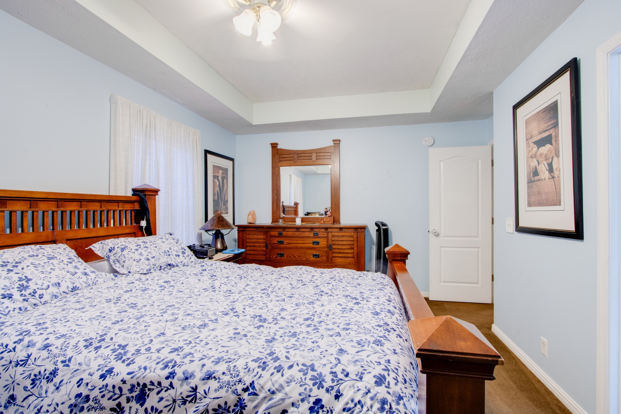 2832 Rader Ridge Court Antioch, TN 37013 - Photo 23 of 26 a bed room with a bed and a dresser