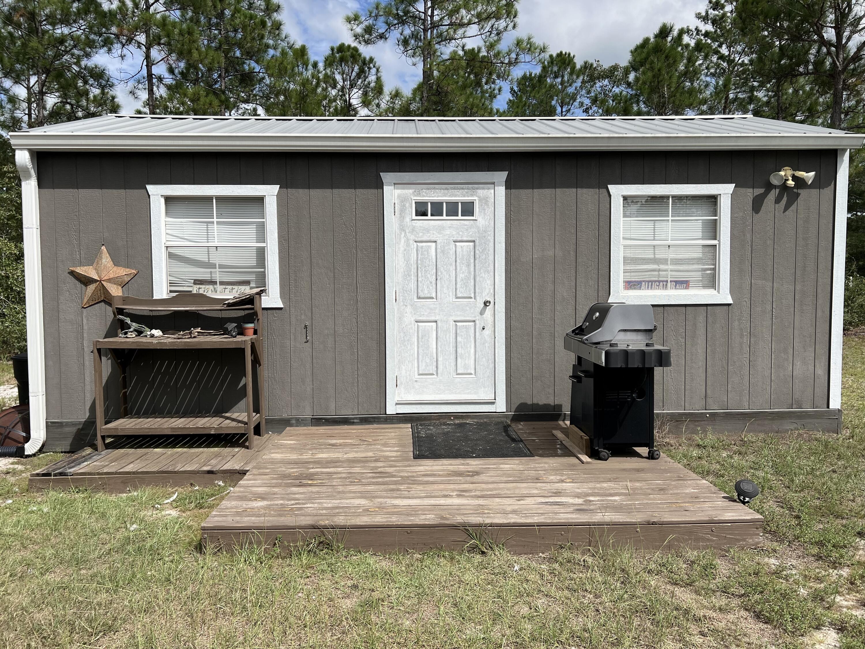 403 Don Graff Road Freeport, FL 32439 - Photo 19 of 34 a front view of a house