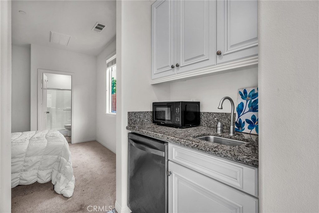 28217 Nield Court Saugus, CA 91350 - Photo 9 of 41 Multi gen kitchenette and laundry