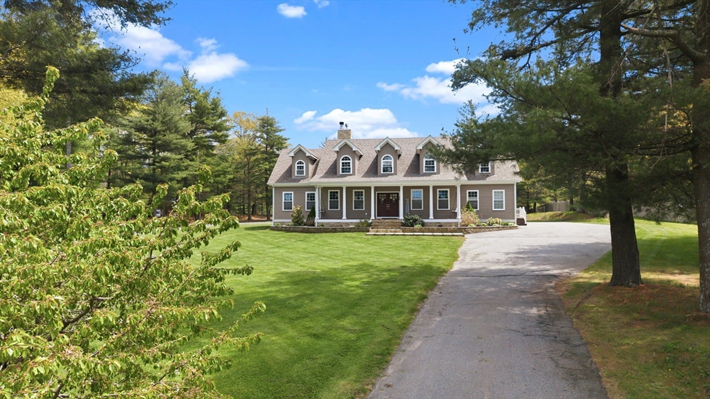35 High Street Freetown, MA 02702 - Photo 1 of 40 a front view of a house with a garden
