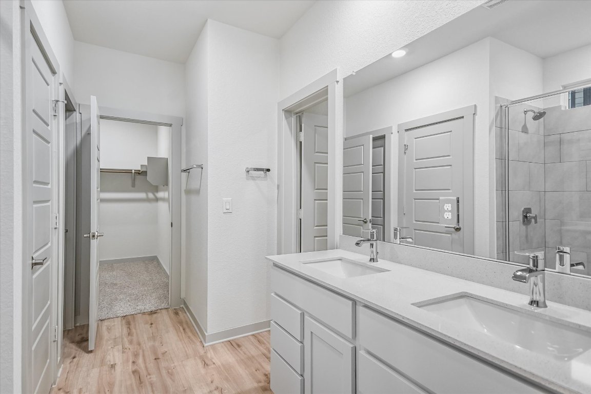 132 Shawii Pass Leander, TX 78641 - Photo 13 of 35 Large walk-in shower, dual sink vanity, walk-in closet
