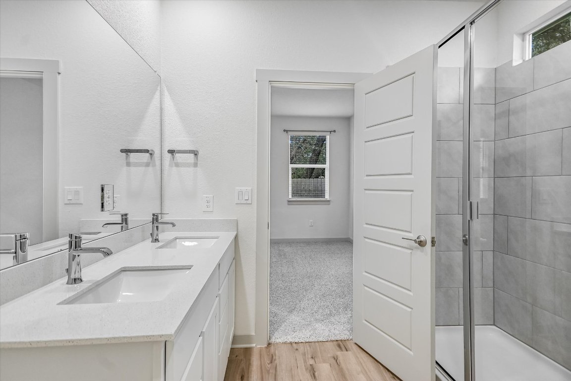 132 Shawii Pass Leander, TX 78641 - Photo 14 of 35 Large walk-in shower, dual sink vanity, walk-in closet