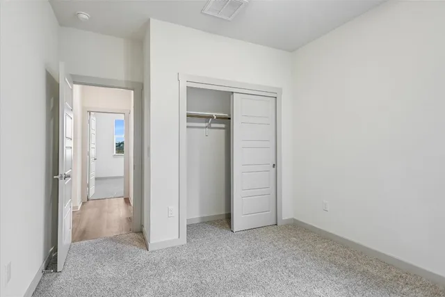 a bathroom with a sink toilet and vanity