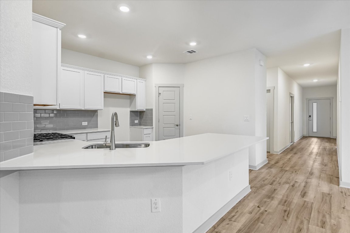 132 Shawii Pass Leander, TX 78641 - Photo 35 of 35 Desirable open floor plan with the kitchen open to the dining and living areas.