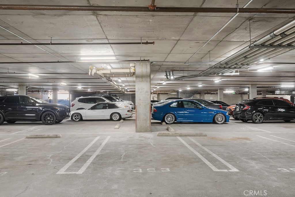 629 Traction Avenue, Unit 312 Los Angeles, CA 90013 - Photo 45 of 45 a view of parking garage with cars parked