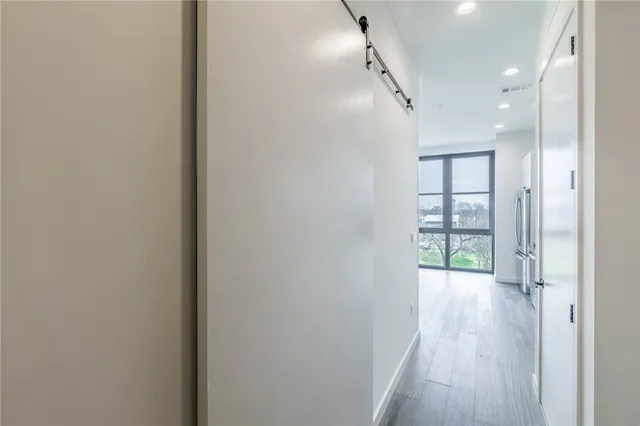 a view of entryway with wooden floor