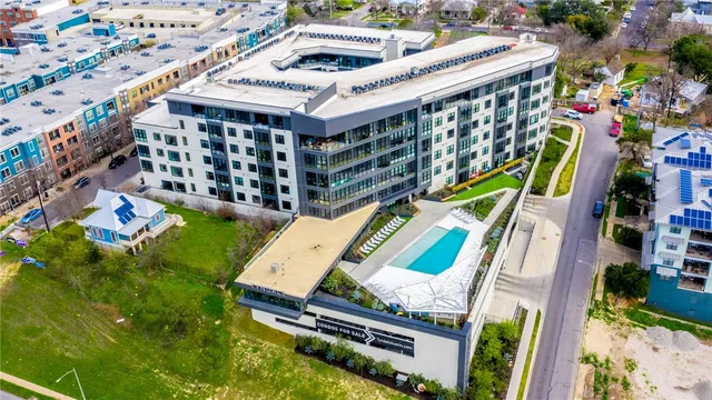 a view of an buildings with a yard