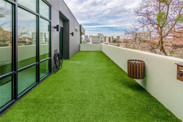 a view of a yard with an outdoor seating
