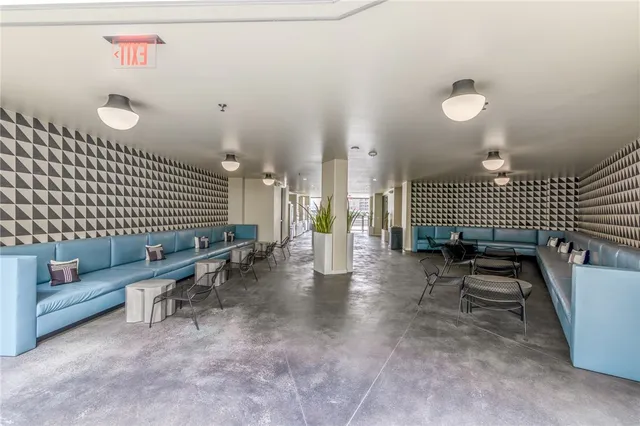 a view of work space with furniture and stairs