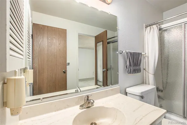 a view of workspace room with window and chair