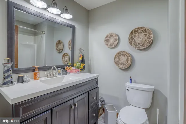 a bathroom with a toilet and a sink
