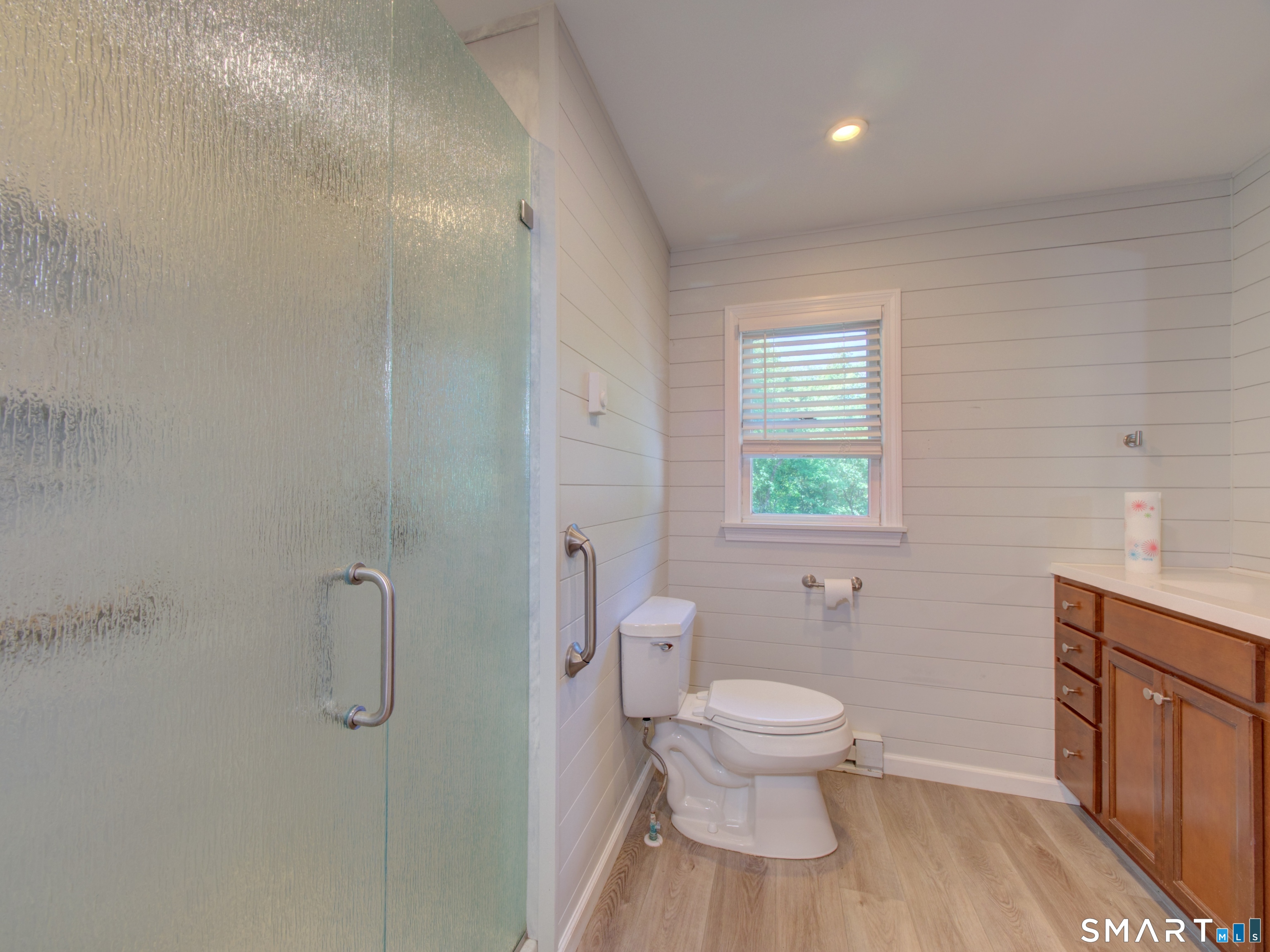 311 Sandy Hollow Road Groton, CT 06355 - Photo 10 of 26 a bathroom with a toilet and a sink