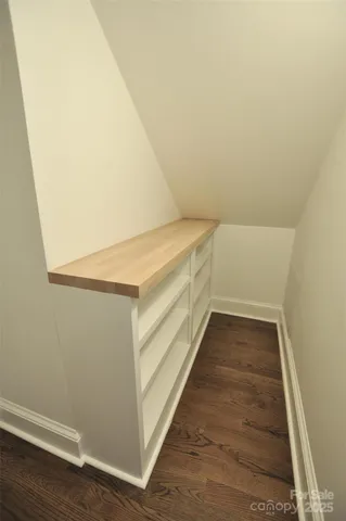 a view of an empty walk in closet