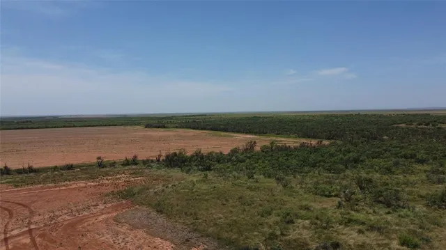 a view of a lake and sunset