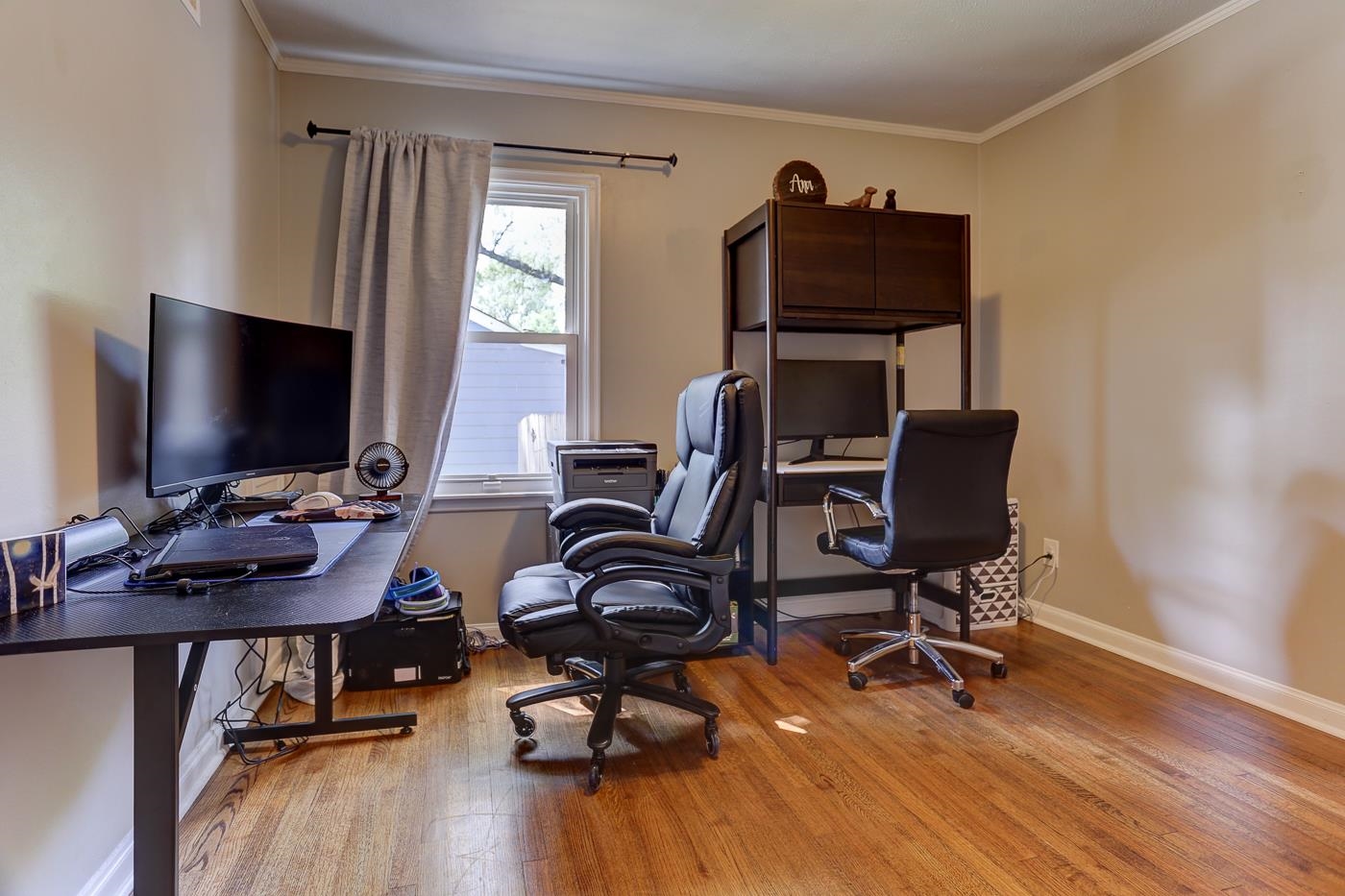 4908 Mockingbird Lane Memphis, TN 38117 - Photo 13 of 21 a view of a workspace with furniture and a window