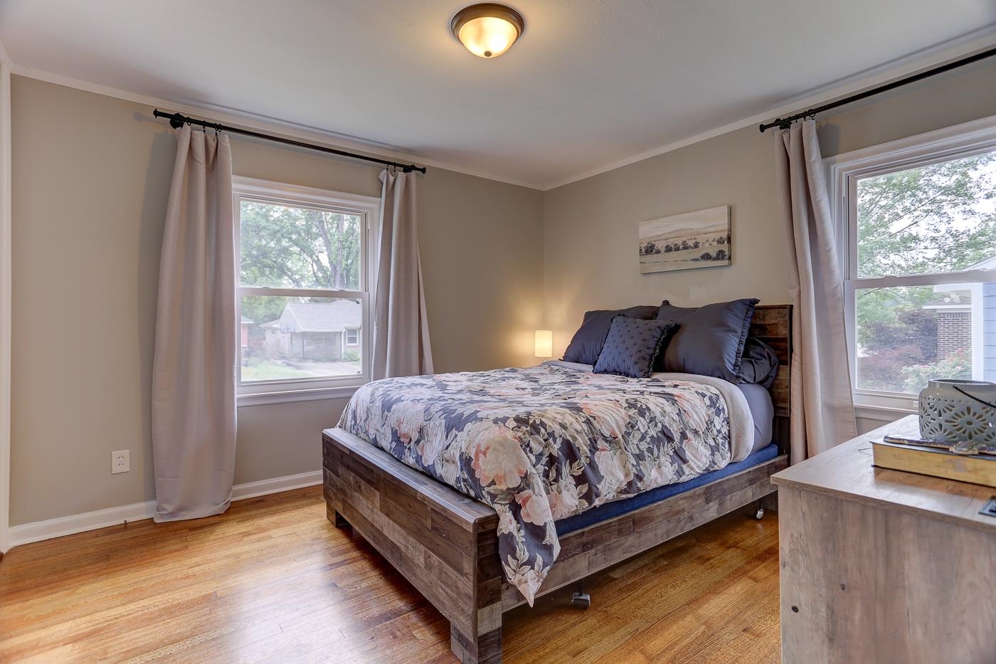 4908 Mockingbird Lane Memphis, TN 38117 - Photo 18 of 21 a bedroom with a bed and window