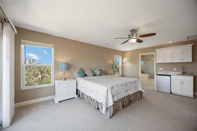 a spacious bathroom with a bathtub and a shower