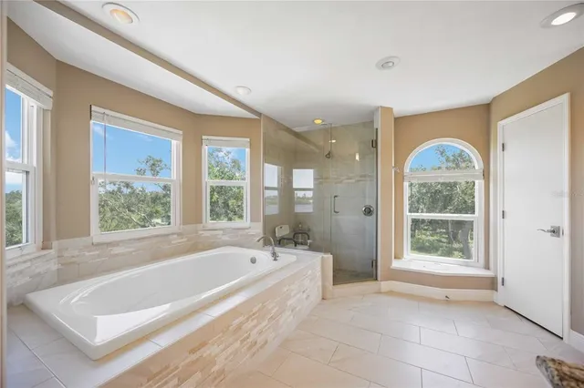 a bathroom with a granite countertop sink mirror and