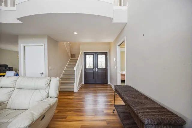a living room with furniture and a rug