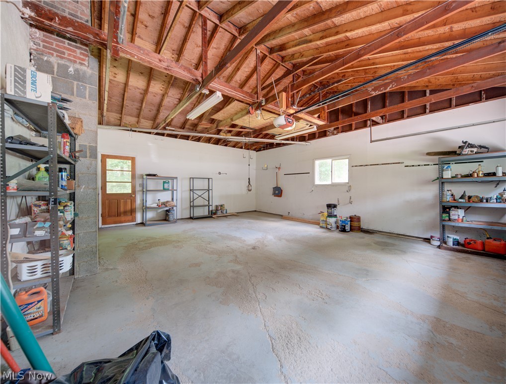 11430 Ferry Road Chesterland, OH 44026 - Photo 22 of 38 Garage featuring a garage door opener