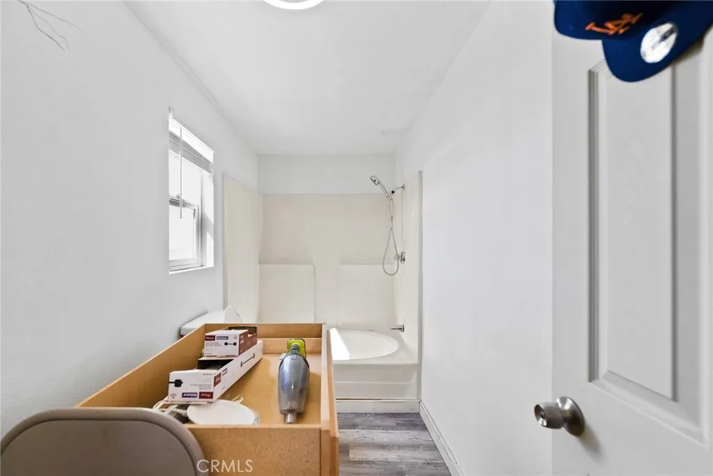 11772 Middleton Road Phelan, CA 92371 - Photo 21 of 40 a living room with furniture and a wooden floor