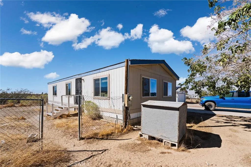 11772 Middleton Road Phelan, CA 92371 - Photo 35 of 40 a view of a house with a yard