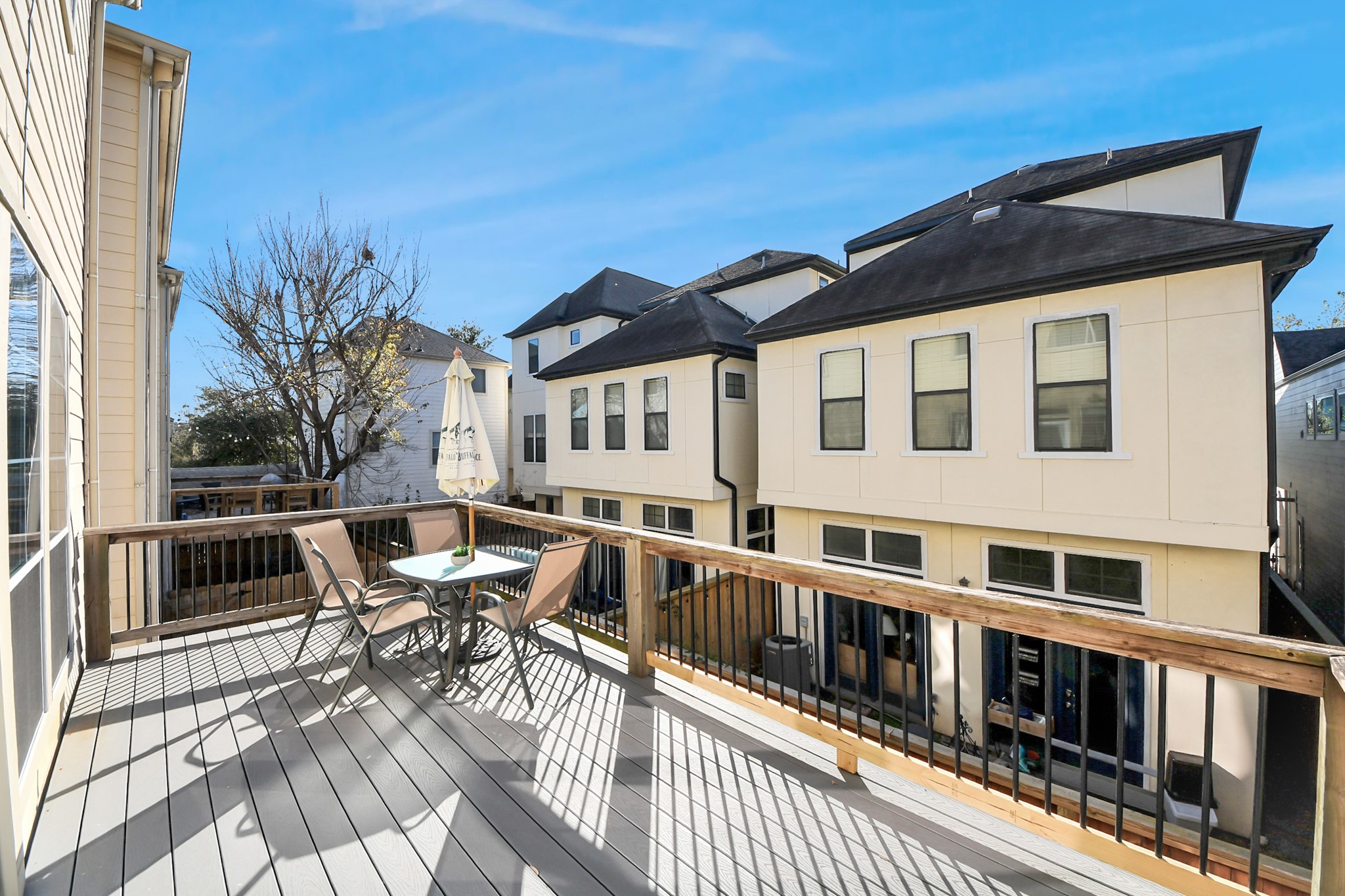 5909 Katy Street Houston, TX 77007 - Photo 4 of 34 Spacious recently updated outdoor deck right off the kitchen, perfect for relaxing with a cup of coffee or outdoor dining.