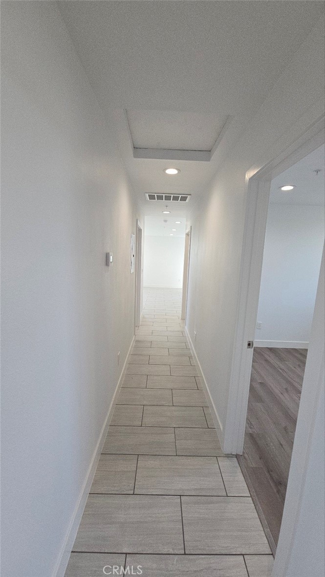 10413 Avalon Boulevard Los Angeles, CA 90003 - Photo 7 of 23 a view of a hallway with stairs