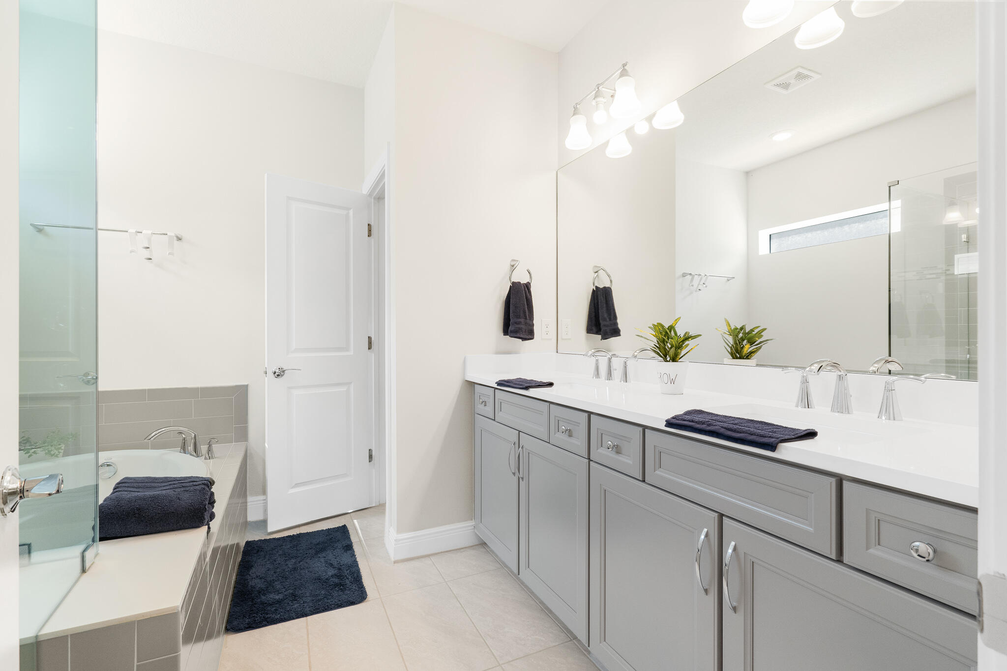 4374 Greenway Drive Hollywood, FL 33021 - Photo 24 of 46 a bathroom with a sink and a mirror