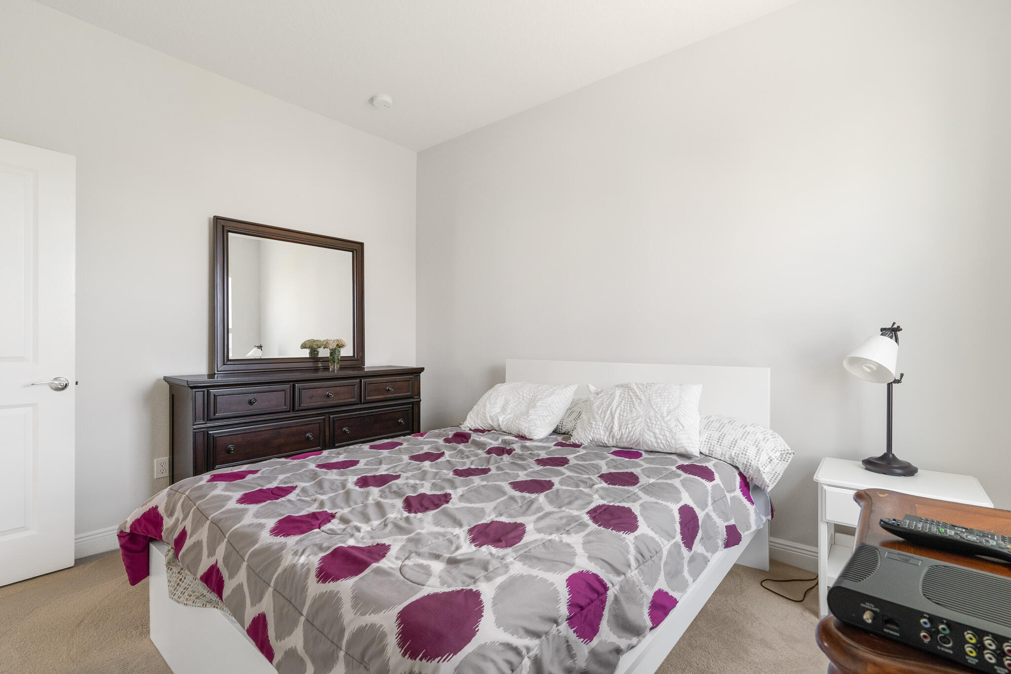 4374 Greenway Drive Hollywood, FL 33021 - Photo 29 of 46 a bedroom with a bed and a dresser