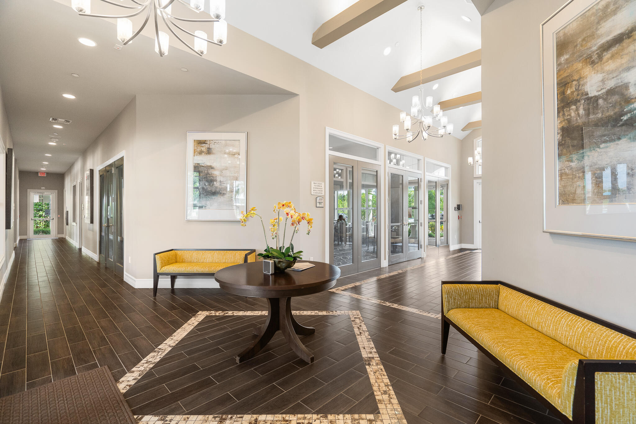 4374 Greenway Drive Hollywood, FL 33021 - Photo 45 of 46 a living room with furniture a table and wooden floor