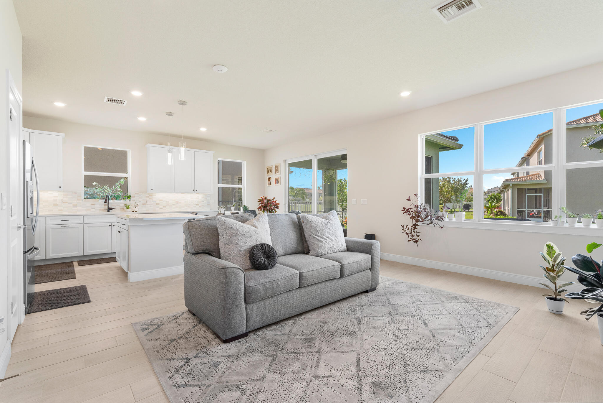 4374 Greenway Drive Hollywood, FL 33021 - Photo 7 of 46 a living room with furniture and a potted plant