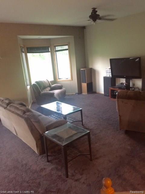 3714 Hannaman Road Columbiaville, MI 48421 - Photo 14 of 16 living room.jpg