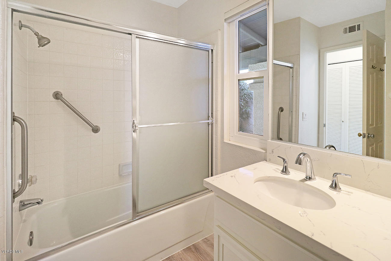 851 Congressional Road Simi Valley, CA 93065 - Photo 20 of 28 a bathroom with a sink and a mirror