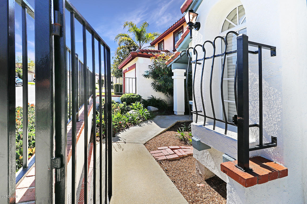851 Congressional Road Simi Valley, CA 93065 - Photo 3 of 28 a view of staircase with wooden floor and a potted plant