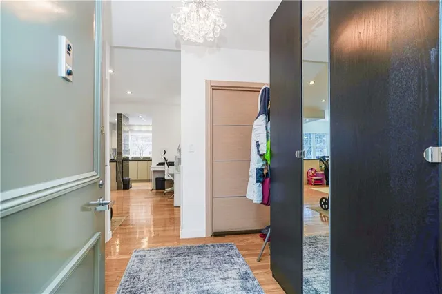 view of hall way with mirror and furniture