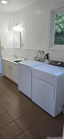 a view of empty room with floor to ceiling windows