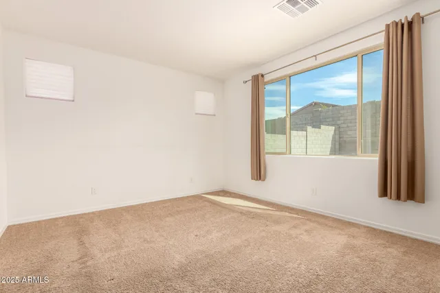 an empty room with closet