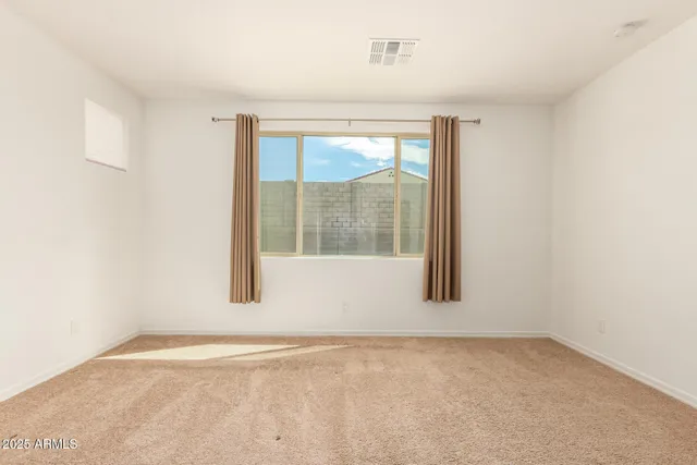 a bathroom with a sink double vanity and a mirror