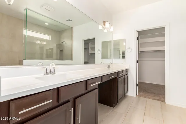 a view of an empty walk in closet