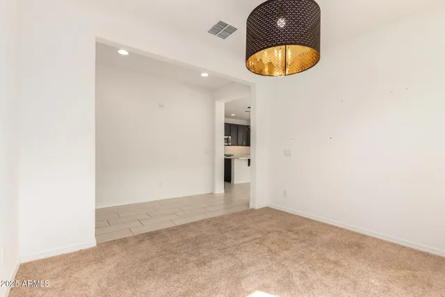 a view of an empty room and window