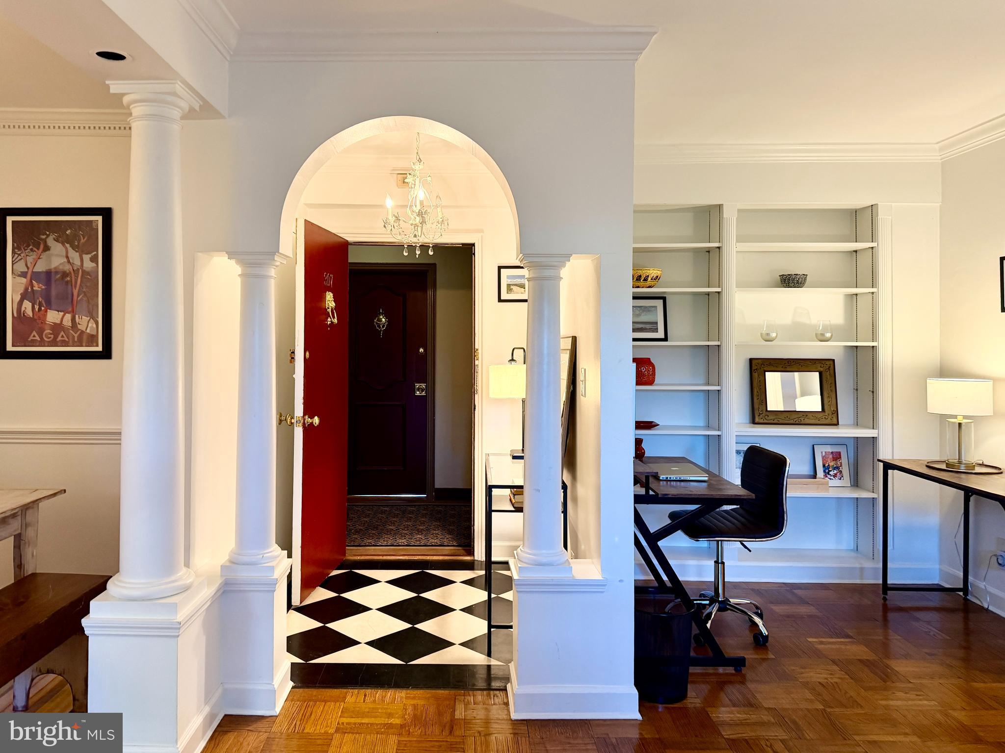 2500 Q Street Northwest, Unit 307 Washington, DC 20007 - Photo 1 of 17 a living room with furniture and a fireplace